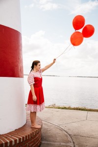 girl with red balloons